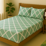 Mint green cotton bedsheet with grid pattern.