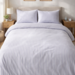 Pastel striped bedsheet with a clean hotel-style look.