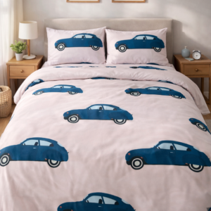 Kids bedsheet with blue car prints on a white background.